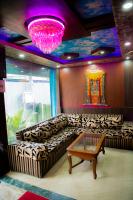 a living room with a couch and a table at Hotel paradise valley view Pvt ltd in Kathmandu