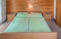 Posteľ alebo postele v izbe v ubytovaní Ferienhaus Mit Eigener Sauna