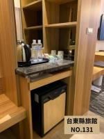 カイシェン スターライト ホテルにあるキッチンまたは簡易キッチン