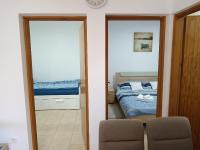 Postel nebo postele na pokoji v ubytování Apartman Pajo