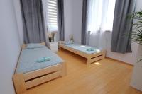 Posteľ alebo postele v izbe v ubytovaní Apartament Słoneczny 5