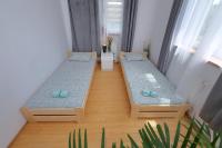 Posteľ alebo postele v izbe v ubytovaní Apartament Słoneczny 5