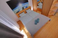 Posteľ alebo postele v izbe v ubytovaní Apartament Słoneczny 5