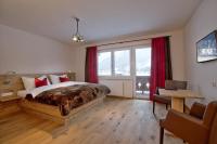 Łóżko lub łóżka w pokoju w obiekcie Chalet Dorfkristall