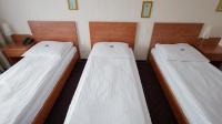 Posteľ alebo postele v izbe v ubytovaní Hotel Sen