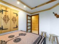 Posteľ alebo postele v izbe v ubytovaní VisitZakopane - Tatrzański Apartment
