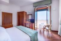 Posteľ alebo postele v izbe v ubytovaní Astura Palace Hotel