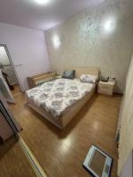Postel nebo postele na pokoji v ubytování DINEVI APARTMENTS