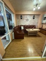 Posezení v ubytování DINEVI APARTMENTS