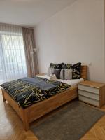 Postel nebo postele na pokoji v ubytování Apartmán Dlouhá 207