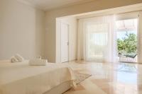 Łóżko lub łóżka w pokoju w obiekcie Cecilia Exclusive Villa Corfu