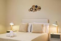 Łóżko lub łóżka w pokoju w obiekcie Cecilia Exclusive Villa Corfu