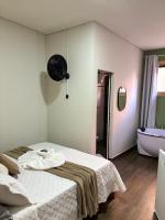Hotel Chão Mineiroにあるベッド