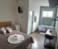 Hotel Chão Mineiroにあるベッド