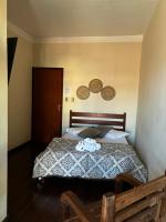 Hotel Chão Mineiroにあるベッド
