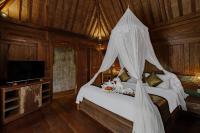 Bubu Mesari Ubud Villaにあるベッド