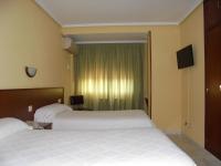 Postel nebo postele na pokoji v ubytování Hostal Athlanta
