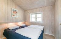 Postel nebo postele na pokoji v ubytování Holiday Home Savnæbban