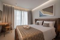 Elegant Maltepe by Travel Pro Services - Kallithea Halkidikiにあるベッド