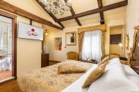Posteľ alebo postele v izbe v ubytovaní Hotel Ca' Alvise