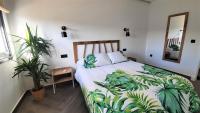 Posteľ alebo postele v izbe v ubytovaní VILLA OASIS Casa Rural ideal Familias y grupos