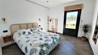 Posteľ alebo postele v izbe v ubytovaní VILLA OASIS Casa Rural ideal Familias y grupos