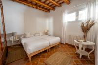 Posteľ alebo postele v izbe v ubytovaní Deco - Casa Voltes Peratallada