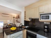 Kuchyň nebo kuchyňský kout v ubytování Apartment Triplex Mare Nostrum by Interhome