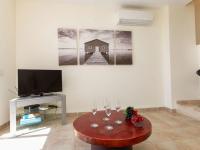 TV a/nebo společenská místnost v ubytování Apartment Triplex Mare Nostrum by Interhome