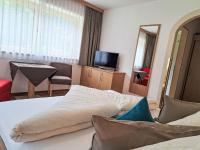 Televízia a/alebo spoločenská miestnosť v ubytovaní Apartment Rosa-5 by Interhome