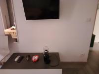 Televízia a/alebo spoločenská miestnosť v ubytovaní Casa vacanze su sorighe.