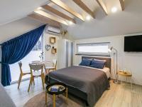 Posteľ alebo postele v izbe v ubytovaní Air-conditioned apartments, pool, sauna, Niechorze