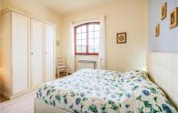 Łóżko lub łóżka w pokoju w obiekcie Villa Lavandaia Toscana