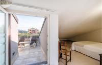 A bed or beds in a room at Villetta Solanum