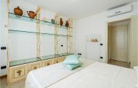 A bed or beds in a room at Villetta Solanum