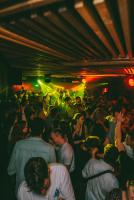 a crowd of people dancing in a club at Timeout Heritage Hotel Zagreb in Zagreb