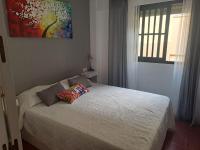 Postel nebo postele na pokoji v ubytování ISLA CANELA URBANIZACION ALCAUDON APARTAMENTO 50M PLAYA