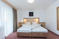 Posteľ alebo postele v izbe v ubytovaní Hotel Garni Ehrenreich