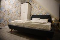 Posteľ alebo postele v izbe v ubytovaní Szczawnica Apartament C6