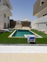 Bazén v ubytování Small lovely cheerful apartment close to El Gouna nebo v jeho okolí