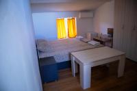 Postel nebo postele na pokoji v ubytování Alpin Guest House