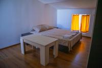 Postel nebo postele na pokoji v ubytování Alpin Guest House