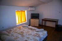 Postel nebo postele na pokoji v ubytování Alpin Guest House