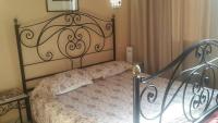 Postel nebo postele na pokoji v ubytování Ariha Hotel