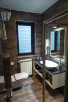 Kúpeľňa v ubytovaní Log In Rooms