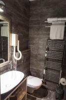 Kúpeľňa v ubytovaní Log In Rooms
