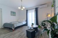 Posteľ alebo postele v izbe v ubytovaní Ivan apartman