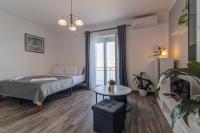 Posteľ alebo postele v izbe v ubytovaní Ivan apartman