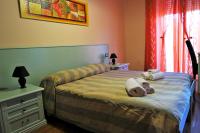 Posteľ alebo postele v izbe v ubytovaní Bosa Guest House