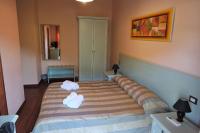 Posteľ alebo postele v izbe v ubytovaní Bosa Guest House